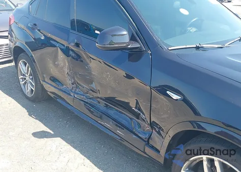 2015 BMW X4 xDrive35I z USA, uszkodzony, nr VIN 5UXXW5C56F0E87412